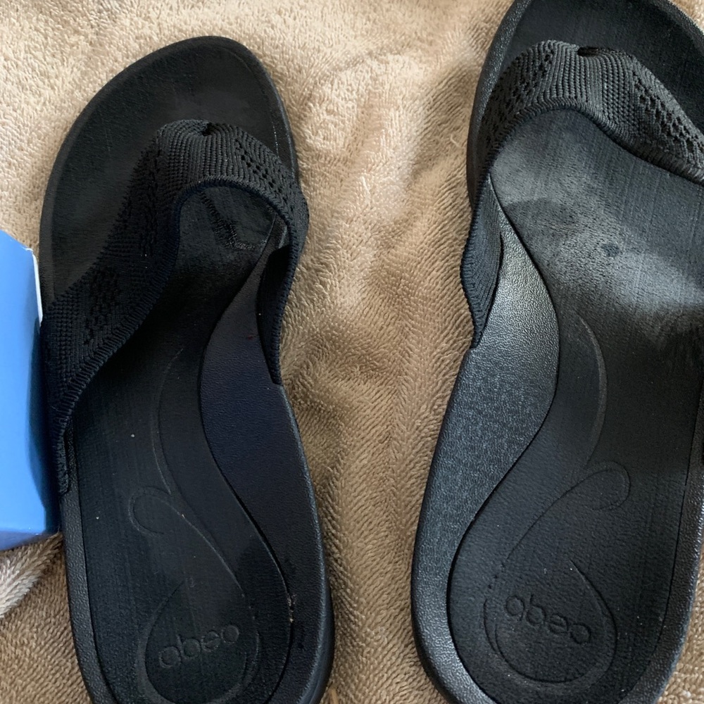 Black flip flops